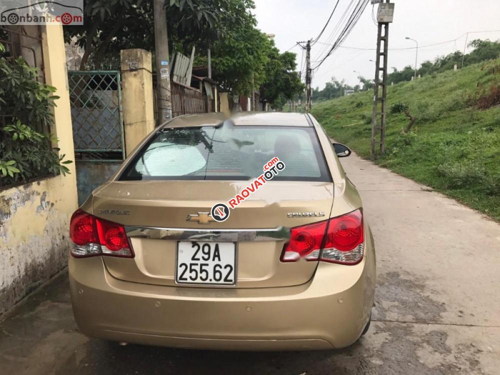 Bán xe Chevrolet Cruze LS sản xuất 2010, màu vàng số sàn-0