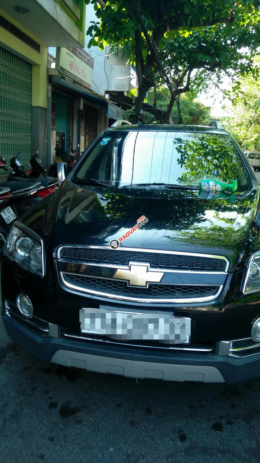 Cần bán xe Chevrolet Captiva LT đăng ký 2010, màu đen, xe gia đình, giá tốt 347tr-0