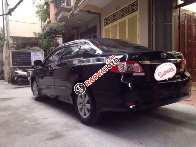 Cần bán Toyota Corolla altis 1.8G AT sản xuất 2014, màu đen chính chủ, giá chỉ 595 triệu-2