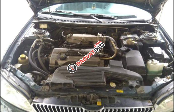 Cần bán lại xe Ford Laser 1.6MT sản xuất 2002 chính chủ, có ABS-1