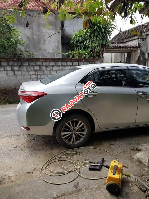 Cần bán Toyota Corolla Altis 1.8G đời 2015, màu bạc  -3