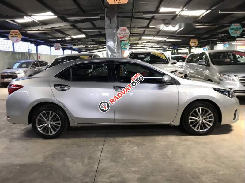 Cần bán xe Toyota Corolla altis 1.8G sản xuất 2016, màu bạc-1