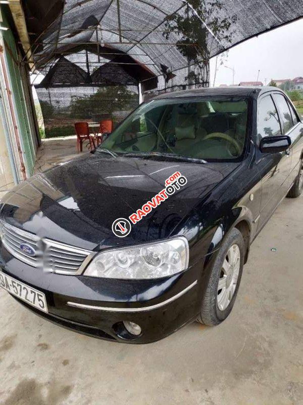 Cần bán xe Ford Laser Ghia sản xuất năm 2004, màu đen-0