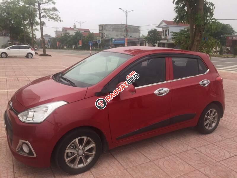 Bán Hyundai Grand i10 1.0 AT sản xuất năm 2016, màu đỏ, đã đi 41730 km-0