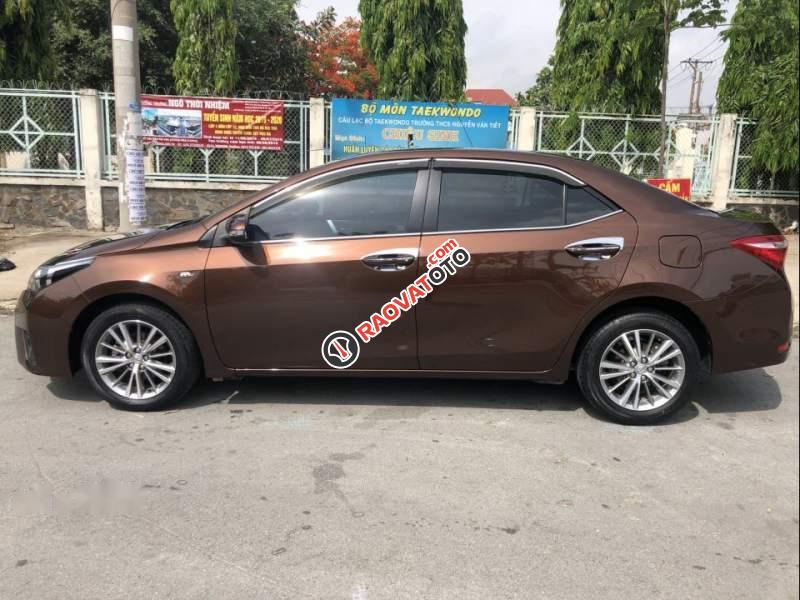 Cần bán lại xe Toyota Corolla altis AT sản xuất 2015, màu nâu chính chủ-4