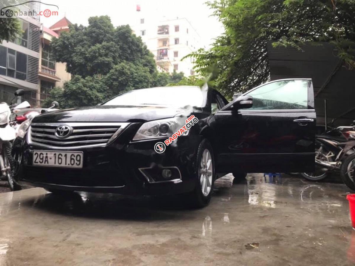 Cần bán gấp Toyota Camry 2.0E năm 2011, màu đen, xe nhập chính chủ  -0