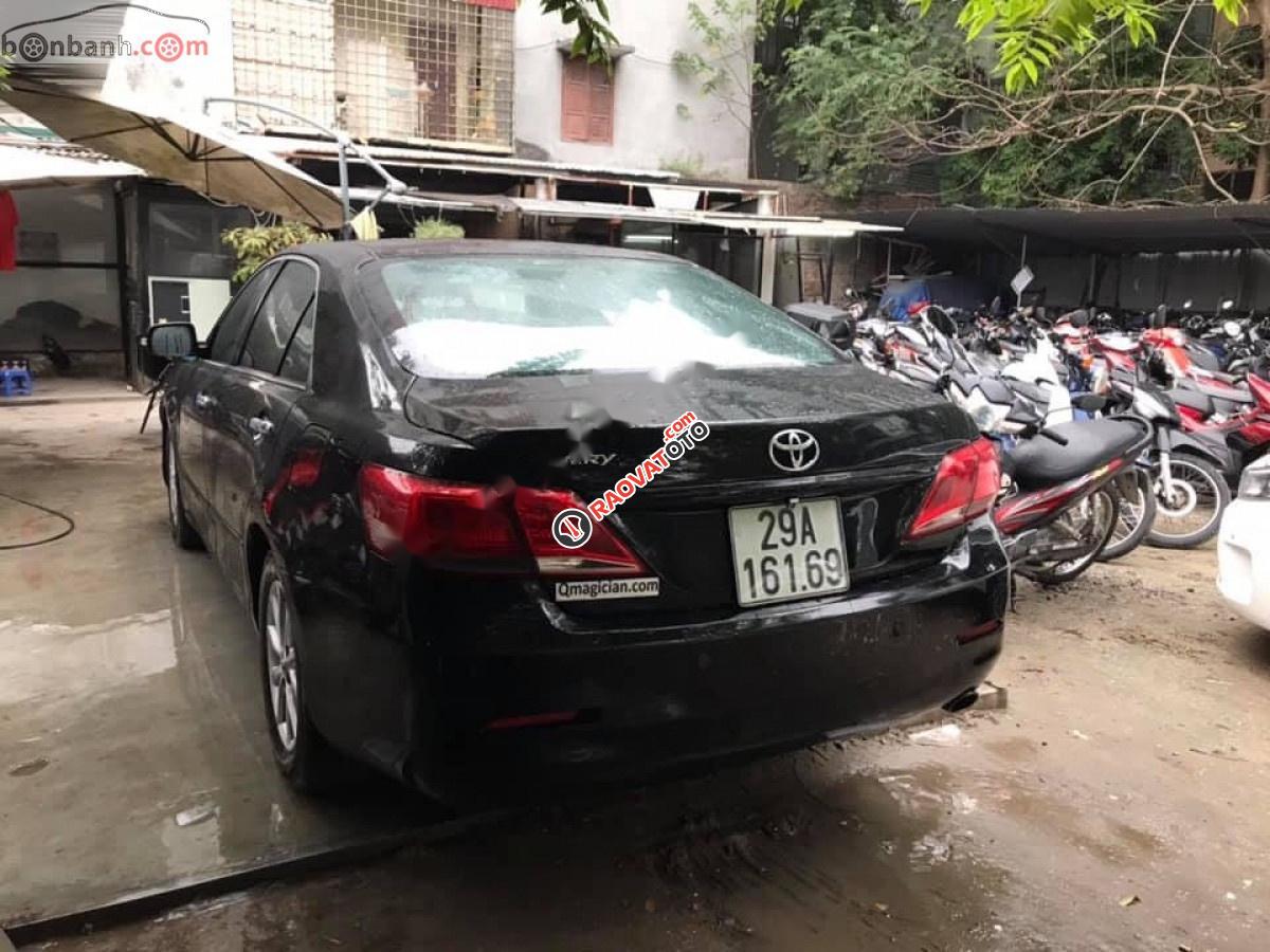 Cần bán gấp Toyota Camry 2.0E năm 2011, màu đen, xe nhập chính chủ  -1