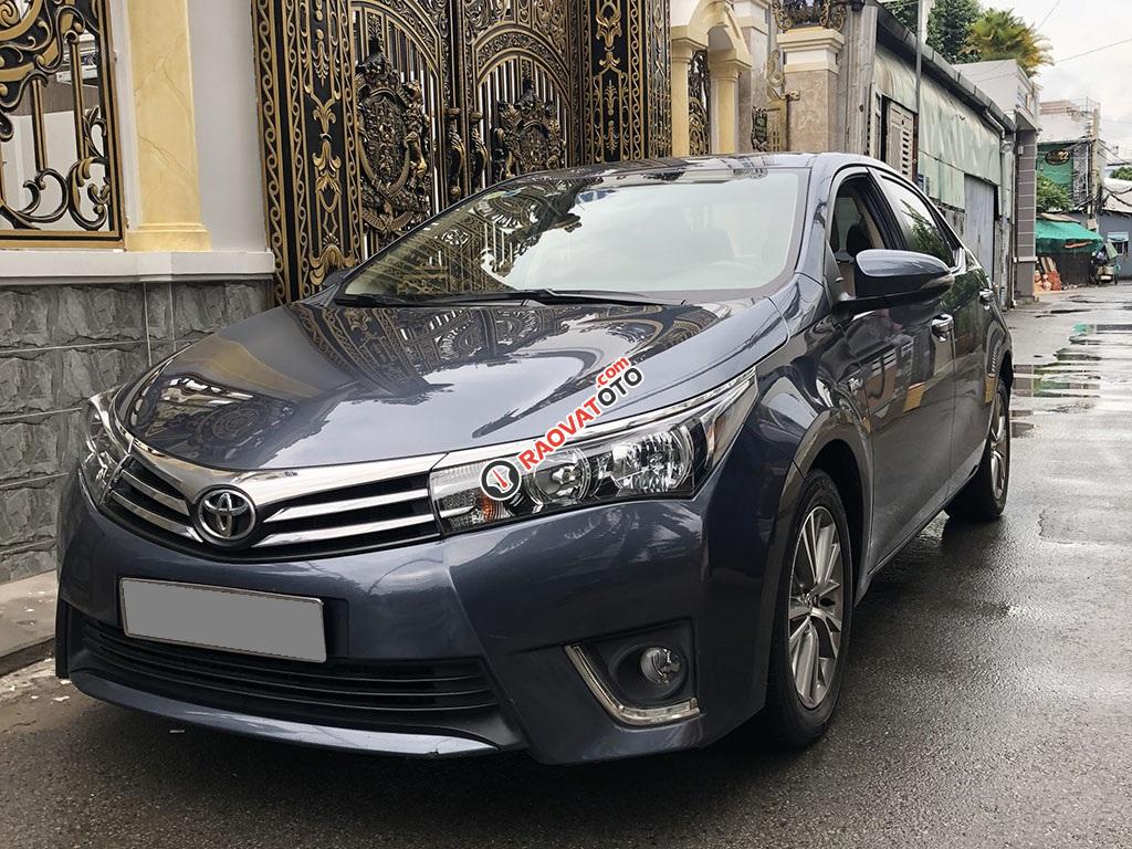 Bán Toyota Altis 2015 số sàn, màu xanh rất đẹp-0