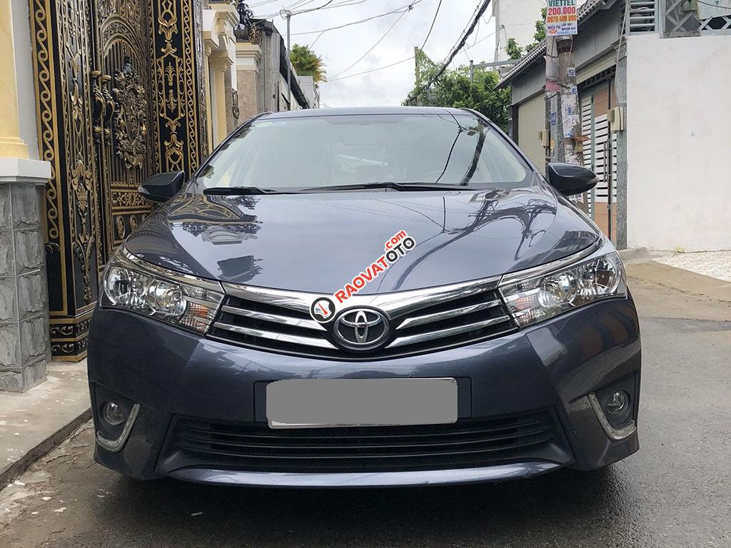 Bán Toyota Altis 2015 số sàn, màu xanh rất đẹp-1