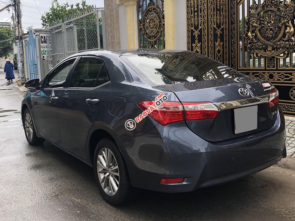 Bán Toyota Altis 2015 số sàn, màu xanh rất đẹp-3