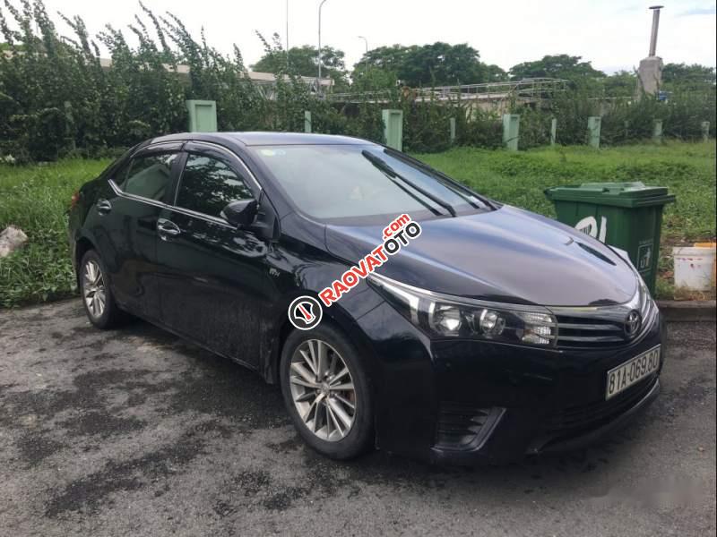 Bán Toyota Corolla altis 1.8MT 2014, màu đen, chính chủ-4