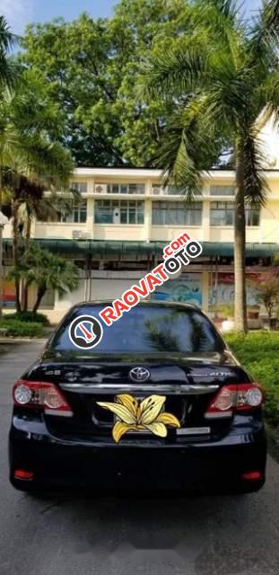 Gia đình bán xe Toyota Corolla Altis 1.8G AT sản xuất cuối 2010, màu đen-1