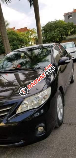 Gia đình bán xe Toyota Corolla Altis 1.8G AT sản xuất cuối 2010, màu đen-0