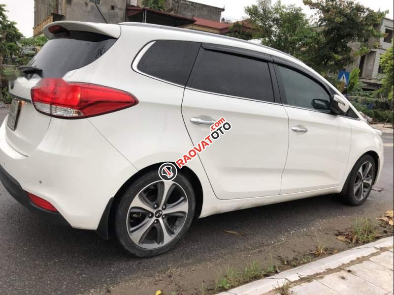 Bán xe Kia Rondo GAT đời 2015, màu trắng-0