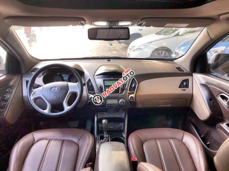 Bán xe Hyundai Tucson 2.0AT 2010, màu vàng, nhập khẩu  -2