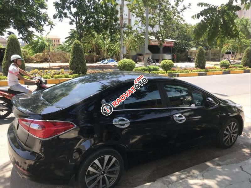 Bán Kia K3 1.6AT đời 2013, màu đen, xe đẹp-1