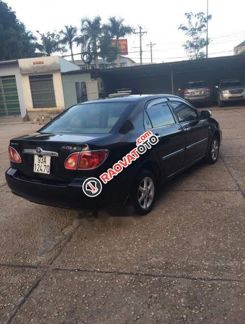 Bán xe Toyota Corolla altis MT đời 2003, màu đen, xe nhập, xe gia đình sử dụng-4