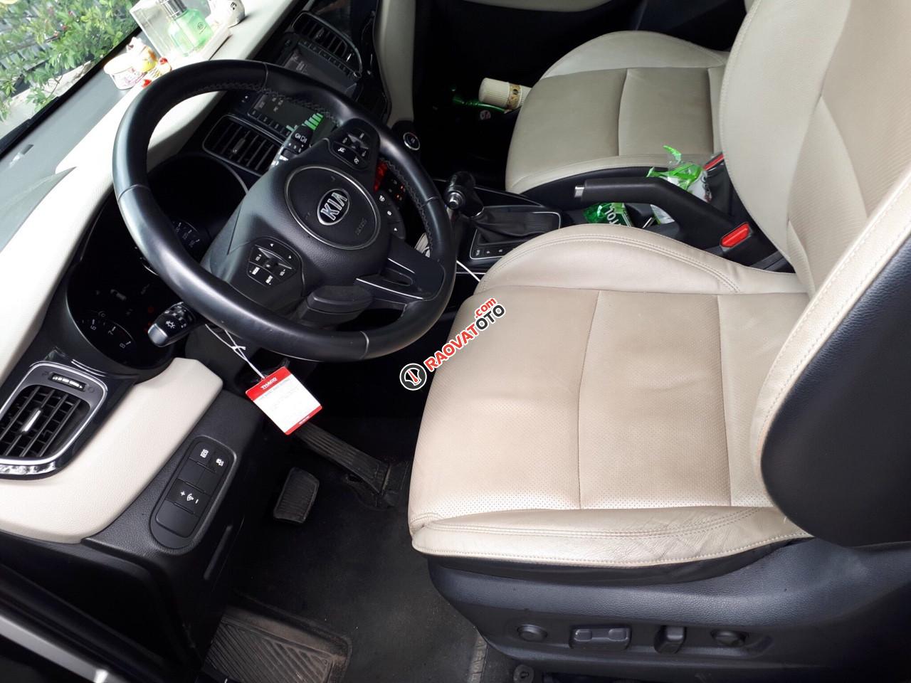 Bán xe Kia Rondo 2.0AT, bản GATH, đời 2015, màu trắng, biển SG-5