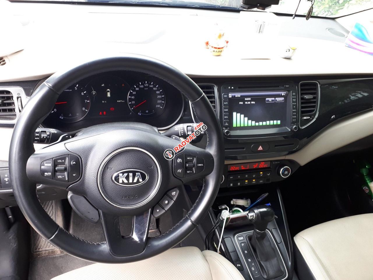 Bán xe Kia Rondo 2.0AT, bản GATH, đời 2015, màu trắng, biển SG-4