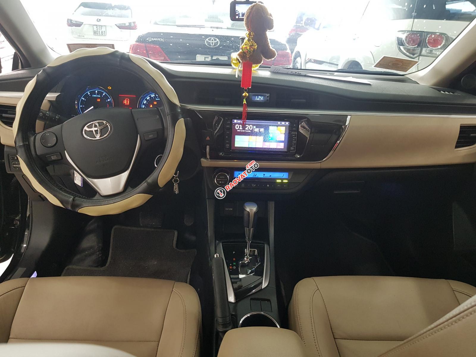 Bán Toyota Corolla altis 1.8G đời 2014, màu đen, 590tr-0