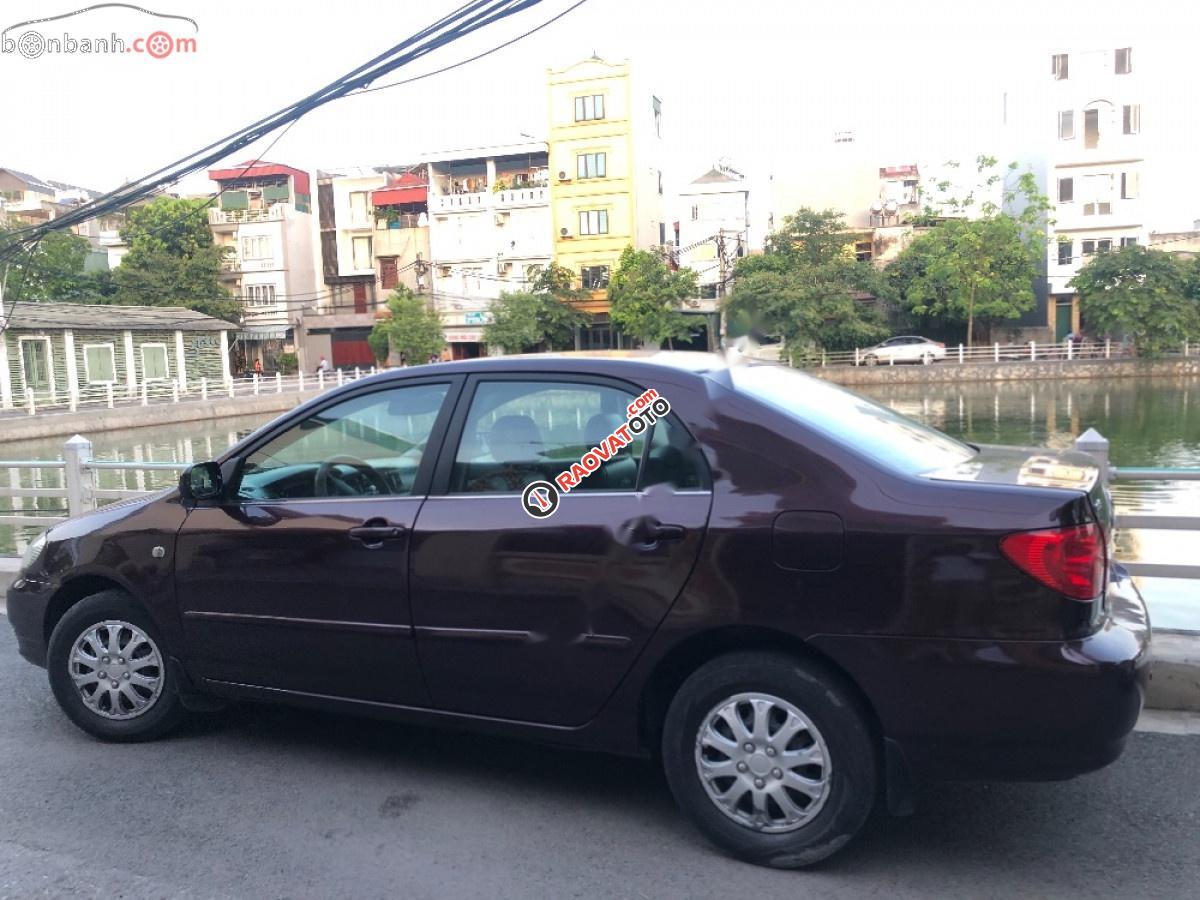 Cần bán Toyota Corolla altis 1.8G MT năm 2002, màu nâu xe gia đình, giá 210tr-1