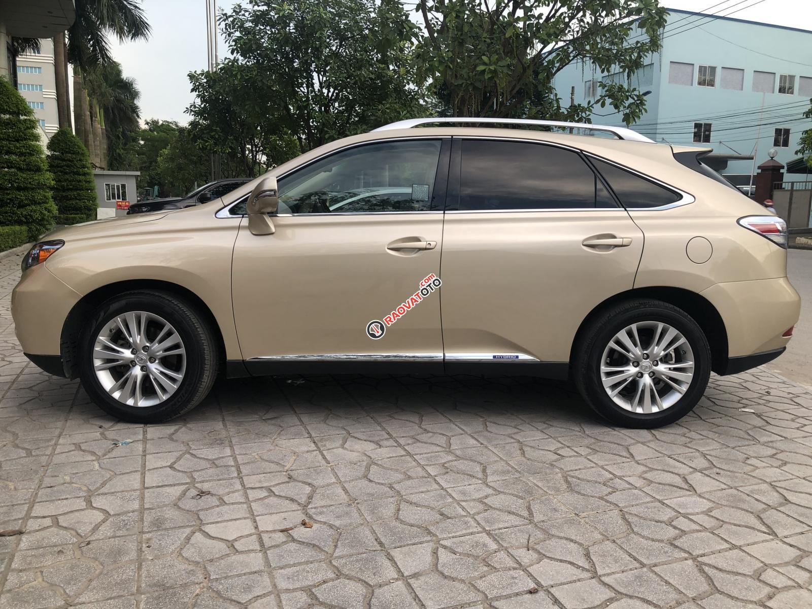 Bán xe Lexus RX450H nhập Mỹ, sản xuất 2010. Xe màu vàng cát, nội thất màu kem-4