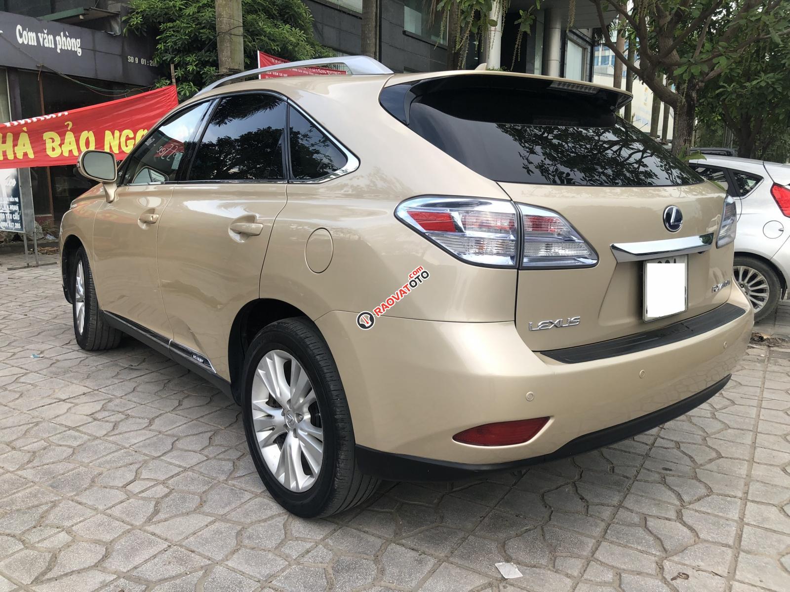 Bán xe Lexus RX450H nhập Mỹ, sản xuất 2010. Xe màu vàng cát, nội thất màu kem-5