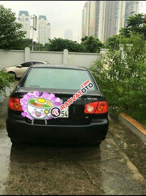 Bán Toyota Corolla altis sản xuất 2003, màu đen, xe còn mới-0