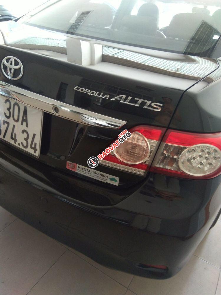 Cần bán xe Toyota Corolla altis AT đời 2011, màu đen số tự động, biển Hà Nội-1