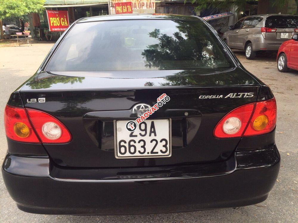 Bán Toyota Corolla altis đời 2003, màu đen-0