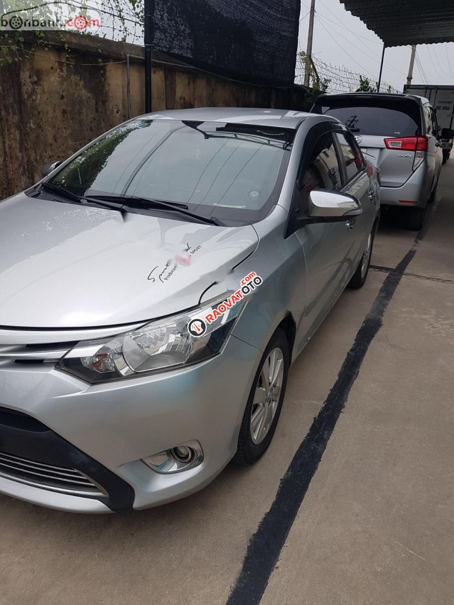 Bán Toyota Vios 1.5E đời 2014, màu bạc, xe gia đình-0