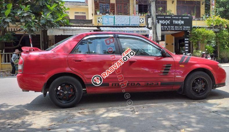 Bán Mazda 323 GLX 2003, màu đỏ, xe gia đình-0