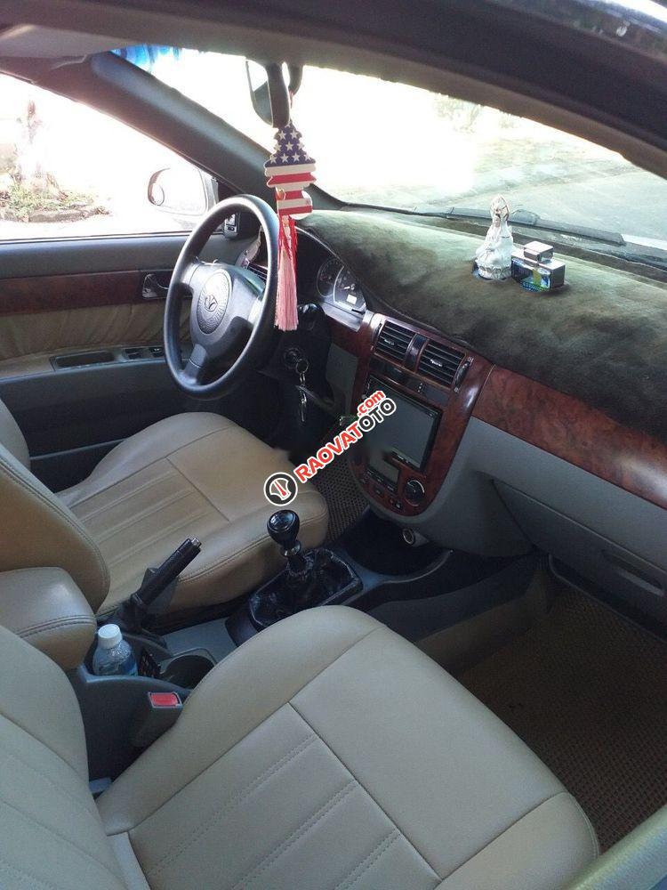 Bán xe Daewoo Lacetti MT 2004, màu trắng, nhập khẩu  -0