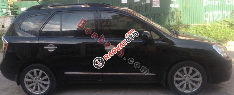 Bán ô tô Kia Carens MT 2010, màu đen-0
