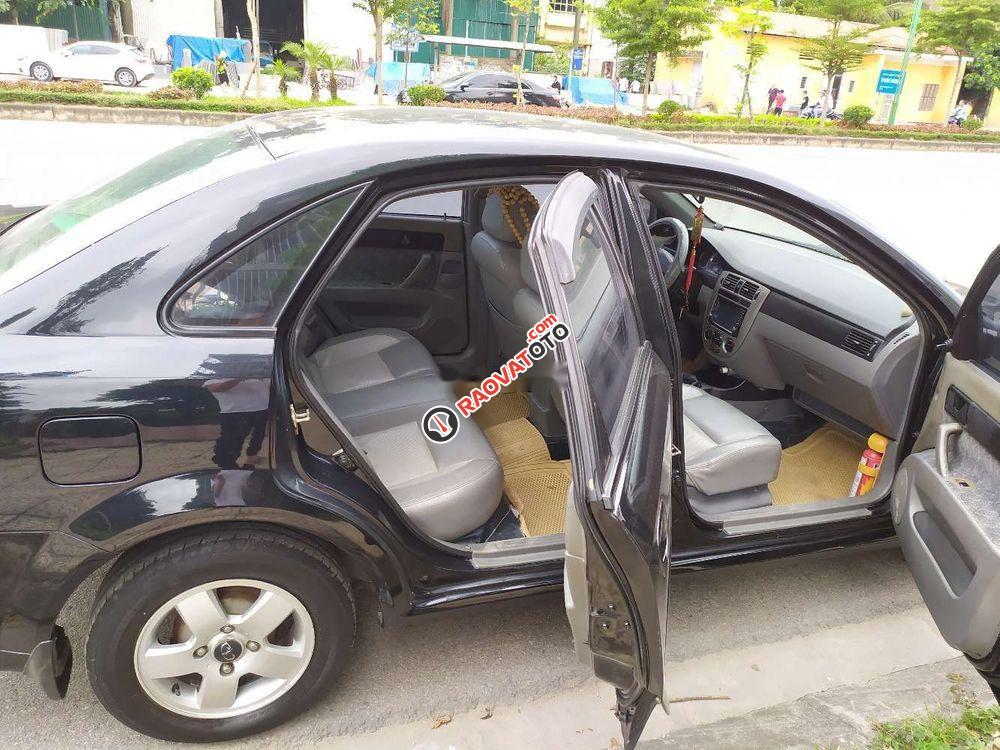 Nhà bán Daewoo Lacetti EX đời 2005, màu đen số sàn-9