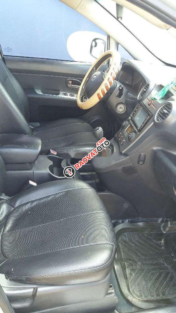 Bán Kia Carens MT 2010, màu bạc xe gia đình-2