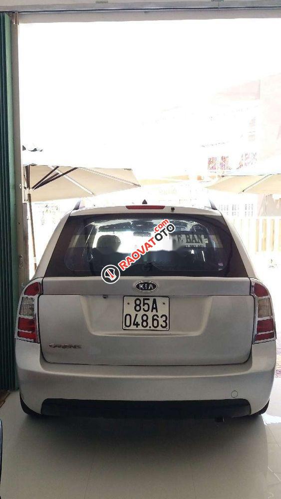 Bán Kia Carens MT 2010, màu bạc xe gia đình-1