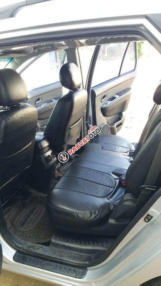 Bán Kia Carens MT 2010, màu bạc xe gia đình-4