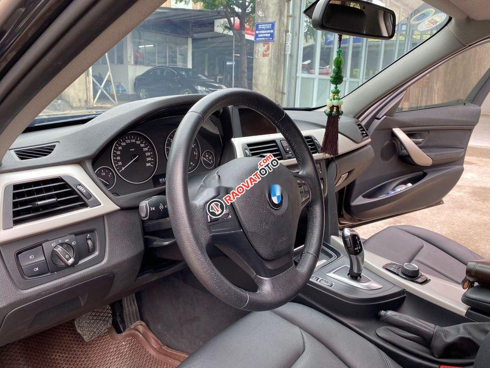 Bán xe BMW 3 Series 320i đời 2014, màu đen-0
