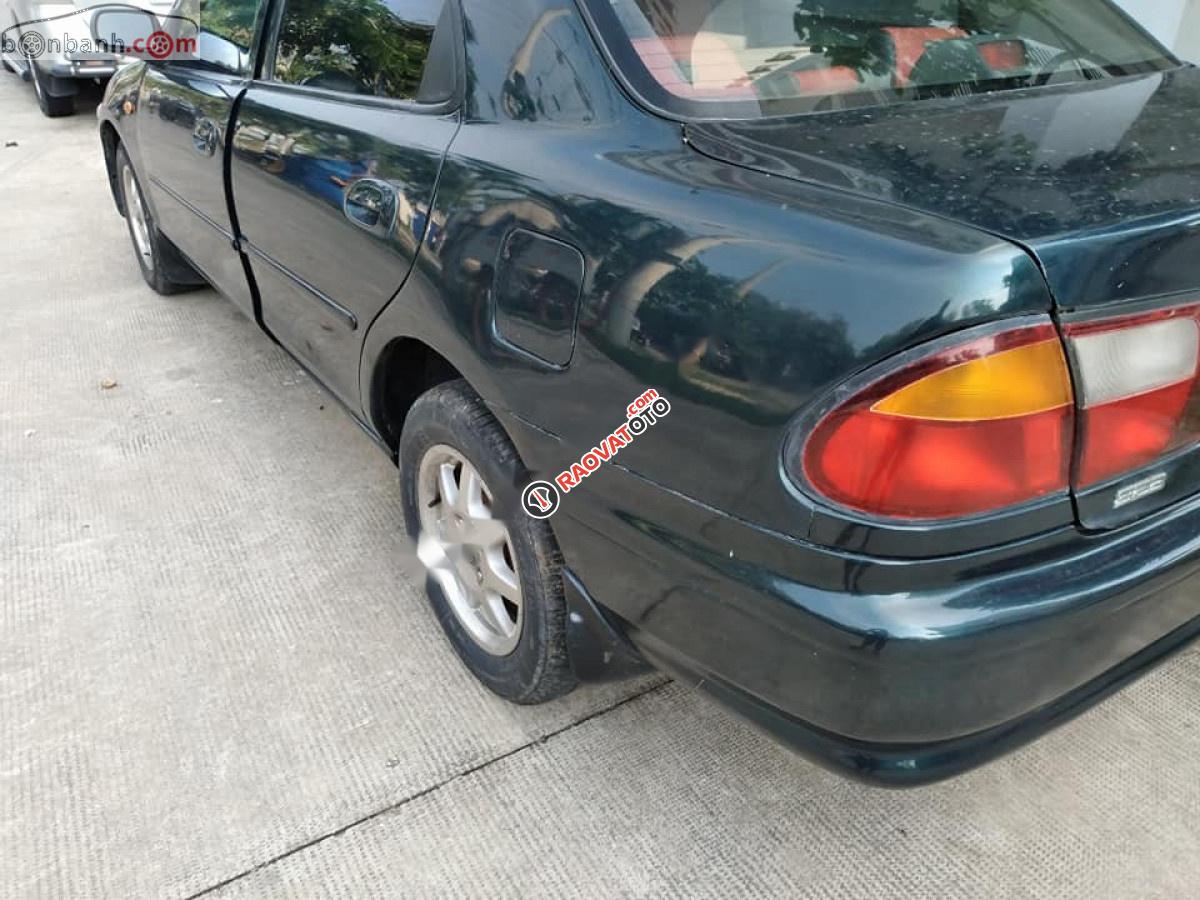 Cần bán gấp Mazda 323 1.6 MT năm 1999, màu xanh lam-0