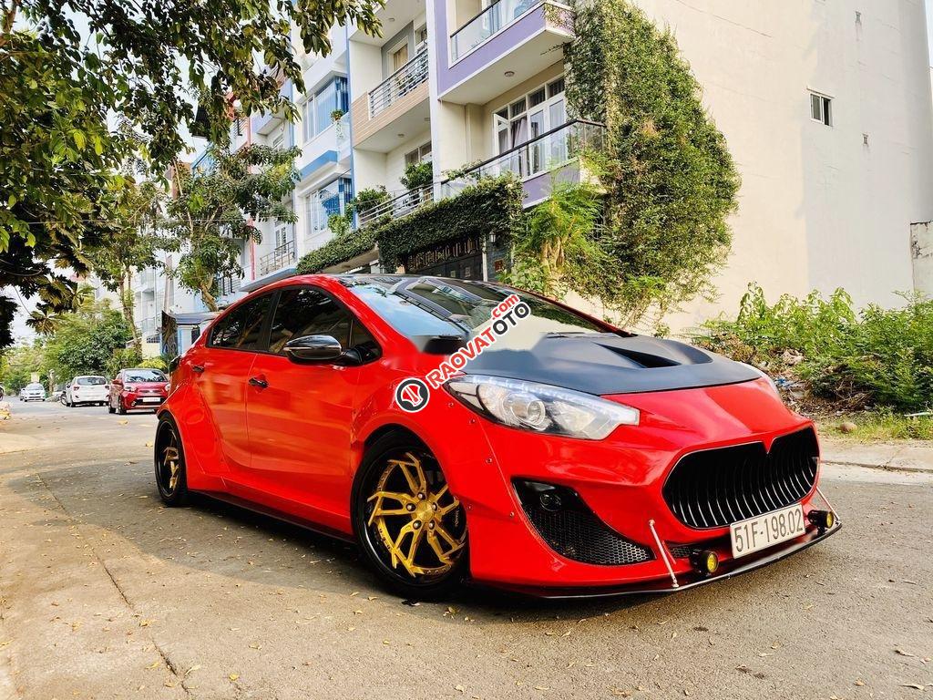 Xe Kia K3 AT đời 2016, màu đỏ, giá chỉ 567 triệu-1