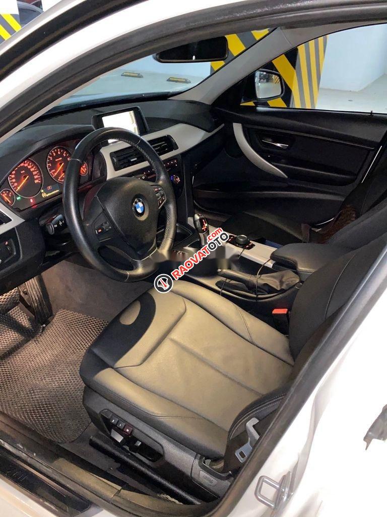 Cần bán lại xe BMW 320i sản xuất 2014, màu trắng, xe nhập, giá 750tr-3