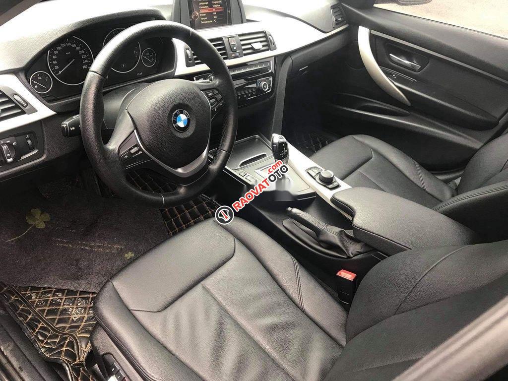 Bán ô tô BMW 320i sản xuất 2015, màu đen, form 2016-1
