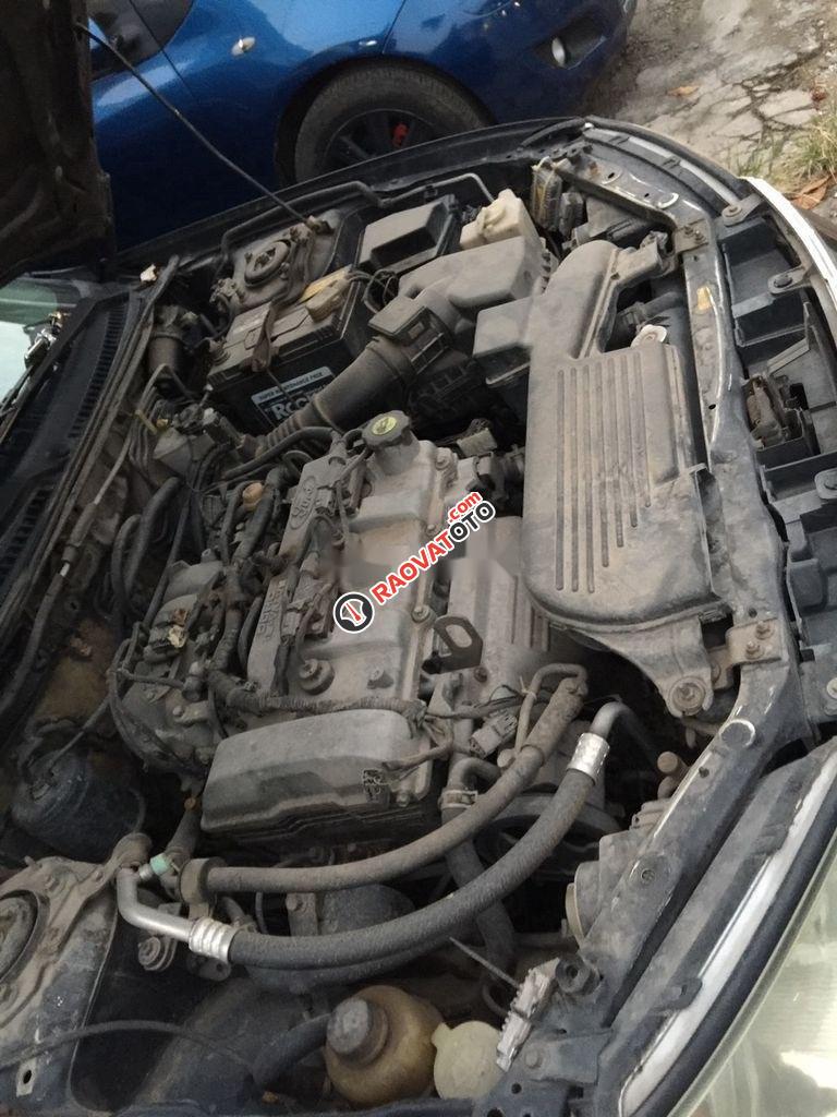 Cần bán xe Ford Laser 1.8AT đời 2003, màu đen số tự động, giá 168tr-1