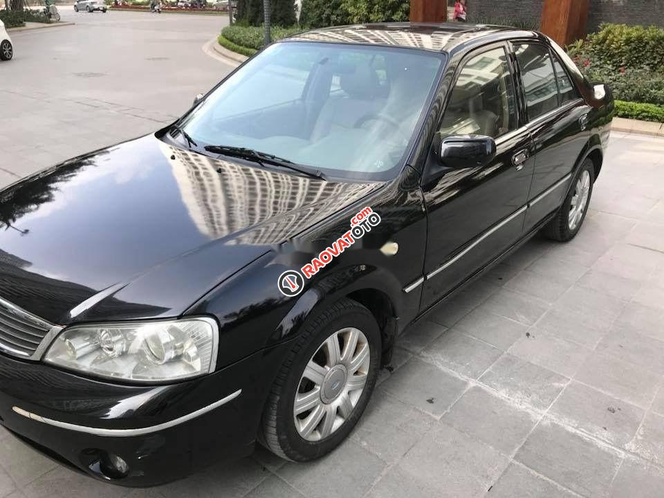 Bán ô tô Ford Laser Ghia AT năm sản xuất 2006, màu đen xe gia đình-7