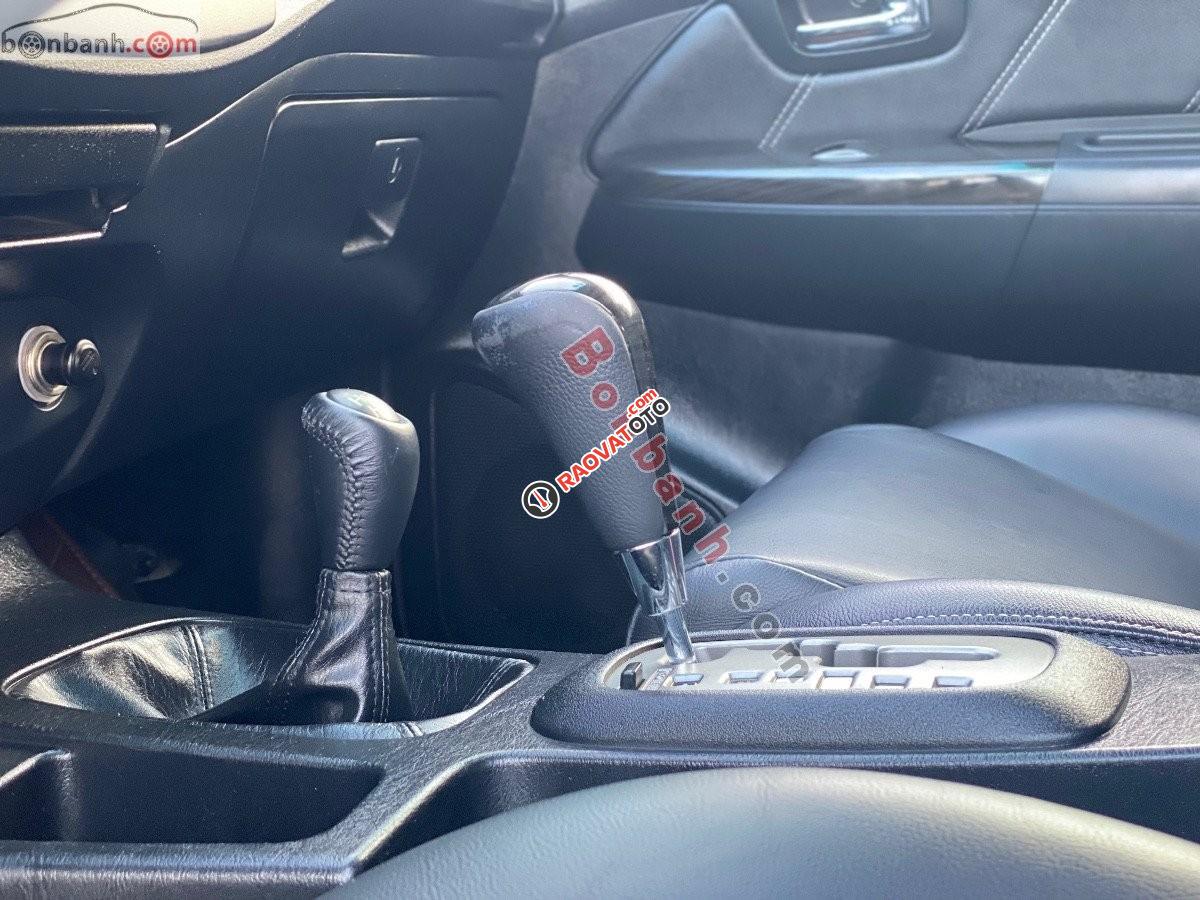 Cần bán Toyota Fortuner 2.7V 4x4 AT sản xuất năm 2014, màu bạc -0