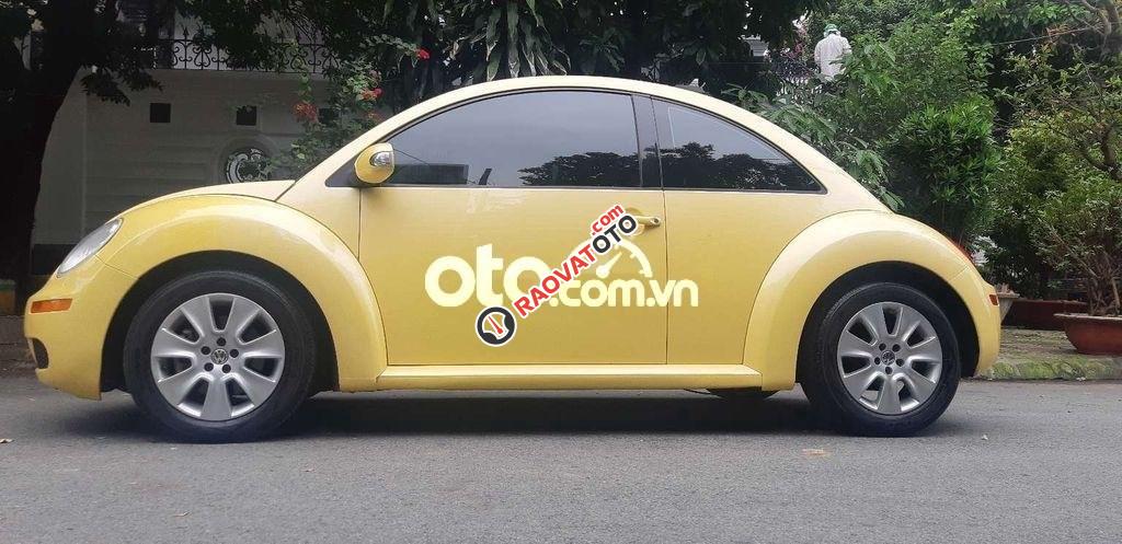 Cần bán xe Volkswagen New Beetle sản xuất 2007, màu vàng, nhập khẩu nguyên chiếc-1