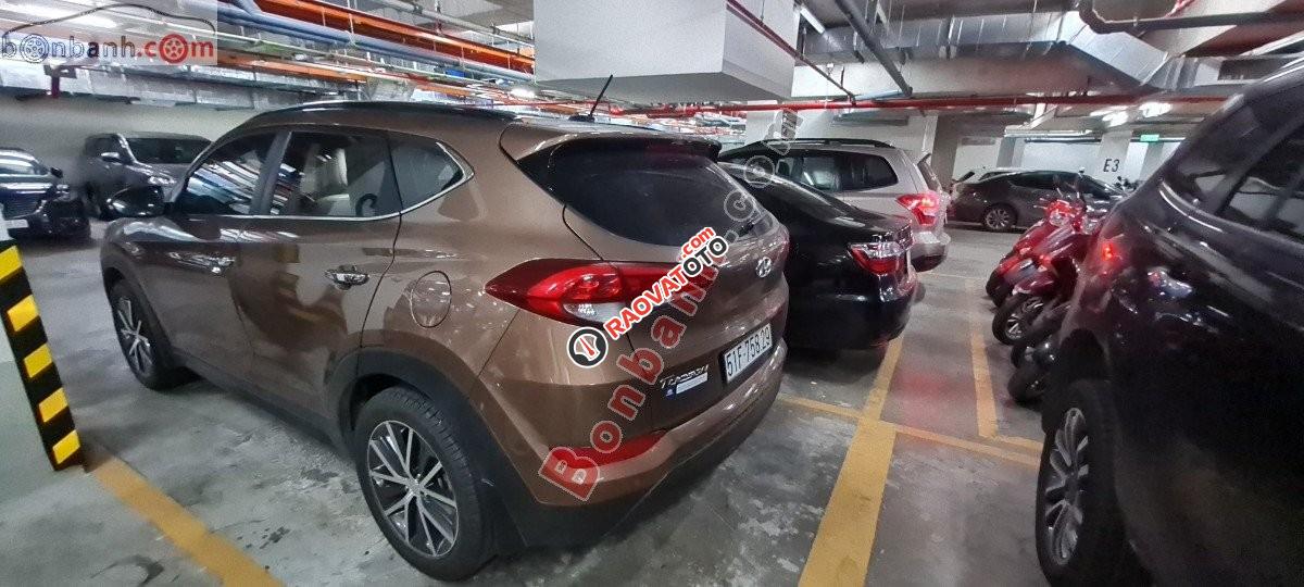 Cần bán gấp Hyundai Tucson 2.0 sản xuất 2016, màu vàng, nhập khẩu -0