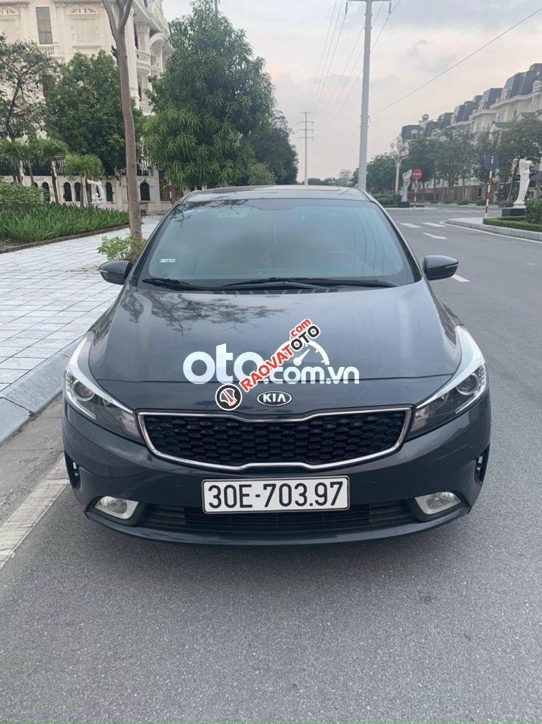 Bán xe Kia Cerato AT đời 2016, màu đen-9