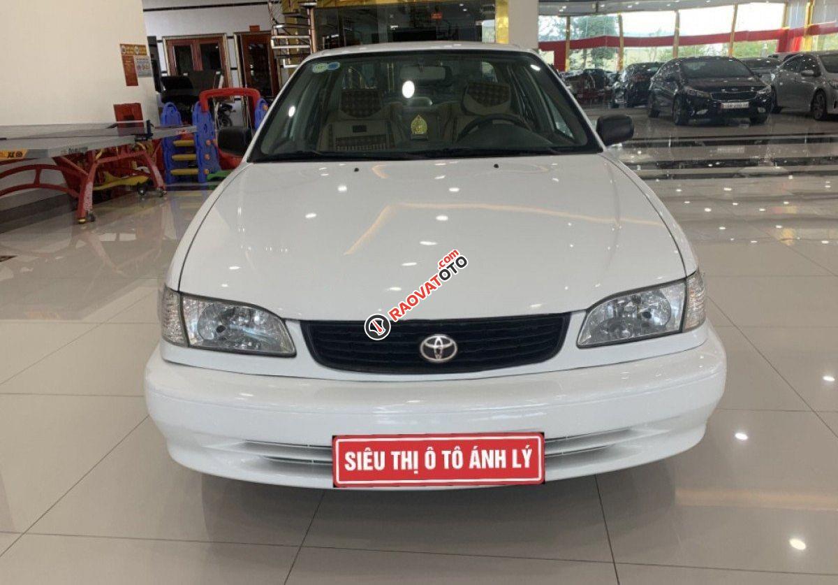 Cần bán Toyota Corolla 1.3MT năm 2001, màu trắng xe gia đình-4